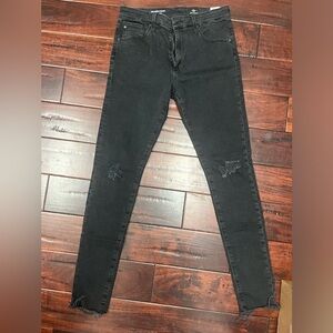 Black AG Farrah Skinny High Rise raw edge with ripped knees
